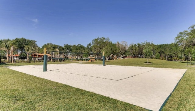 1942 Rankin St, Kissimmee, FL 34744 - view of property's community featuring volleyball court and a lawn