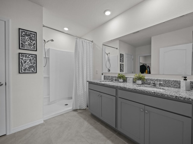 bathroom with vanity, tile patterned flooring, and a shower with shower curtain