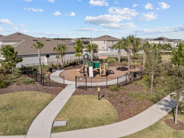 view of play area featuring a lawn