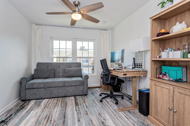 office area with hardwood / wood-style flooring and ceiling fan