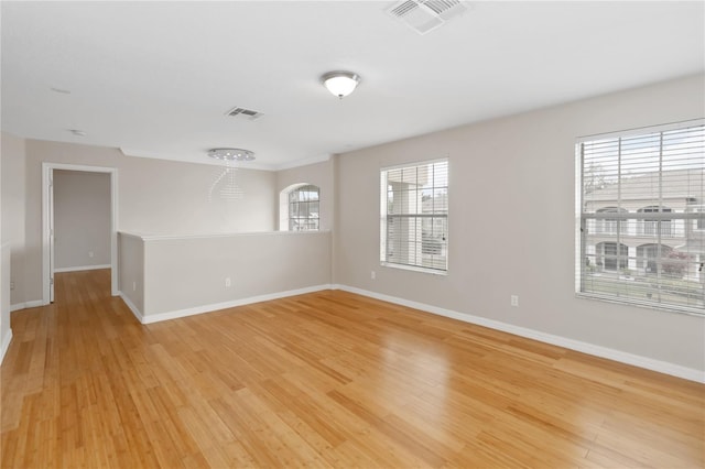 empty room with light wood-type flooring