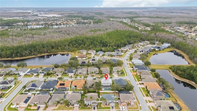 drone / aerial view with a water view