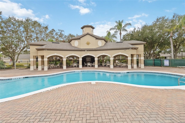 view of swimming pool featuring a patio