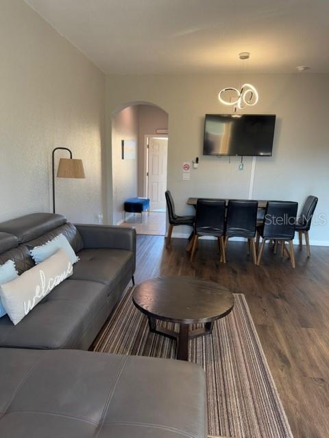 living room featuring dark hardwood / wood-style floors