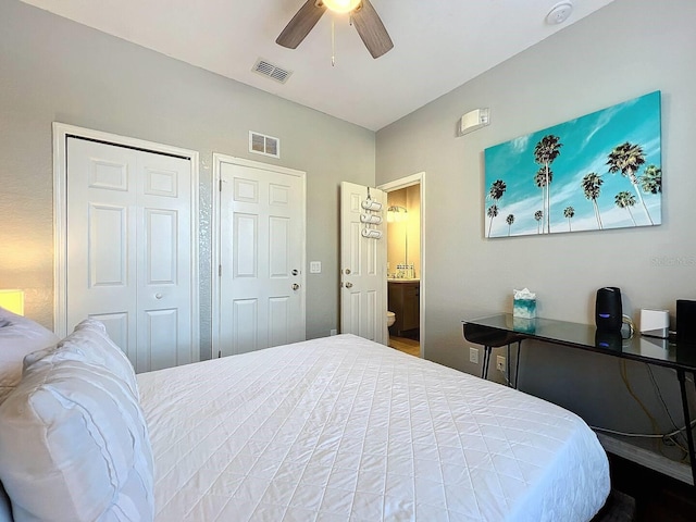 bedroom featuring visible vents, ensuite bath, and a ceiling fan