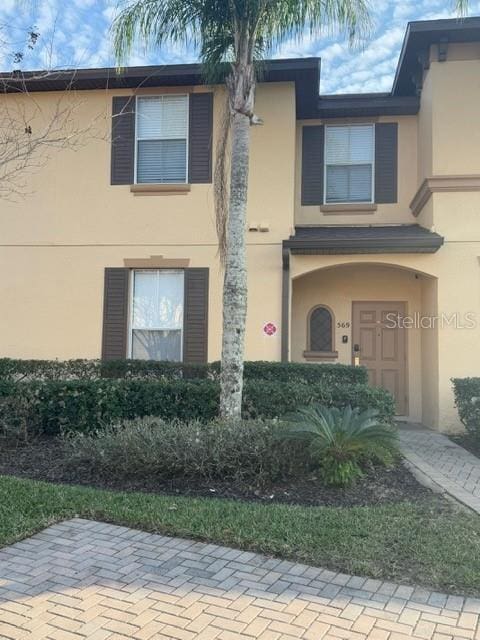 view of front of property featuring stucco siding