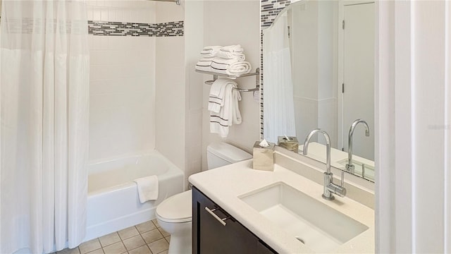 bathroom featuring tile patterned floors, vanity, toilet, and shower / tub combo