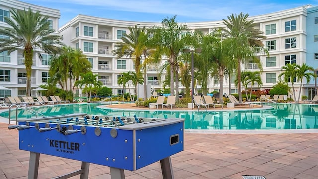 community pool with a patio