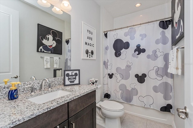 full bathroom with shower / tub combo, vanity, tile patterned floors, and toilet