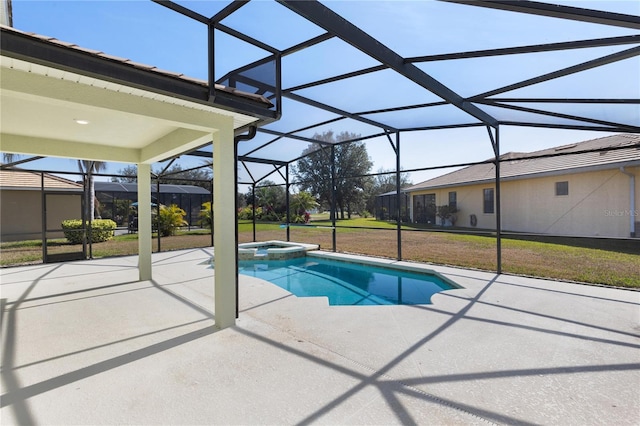 view of pool with an in ground hot tub, a lanai, a lawn, and a patio area