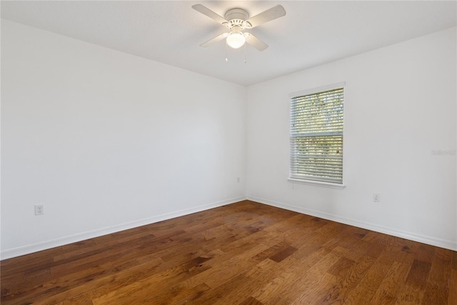 unfurnished room with hardwood / wood-style flooring and ceiling fan