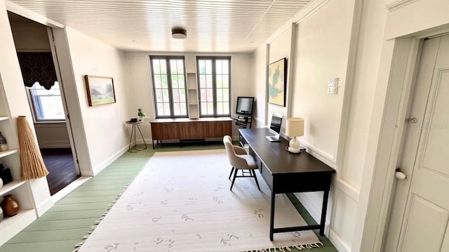 214 N New Hampshire Ave, Tavares, FL 32778 - office with wood finished floors, healthy amount of natural light, and baseboards