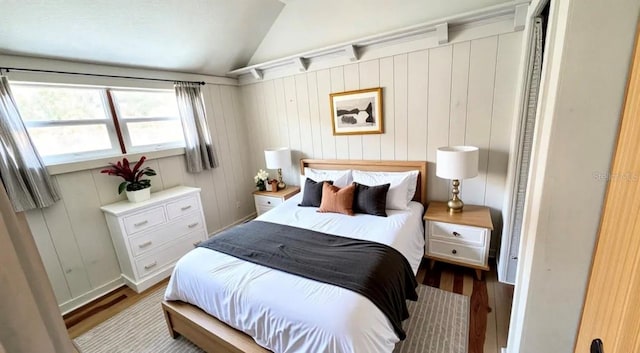 214 N New Hampshire Ave, Tavares, FL 32778 - bedroom with lofted ceiling and wood finished floors