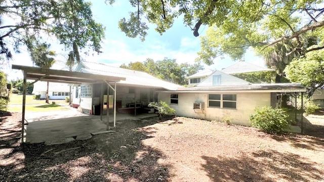 214 N New Hampshire Ave, Tavares, FL 32778 - view of rear view of house