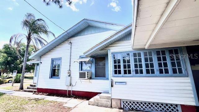214 N New Hampshire Ave, Tavares, FL 32778 - view of home's exterior with cooling unit