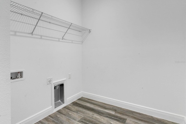 laundry room featuring dark wood-type flooring, washer hookup, and hookup for an electric dryer