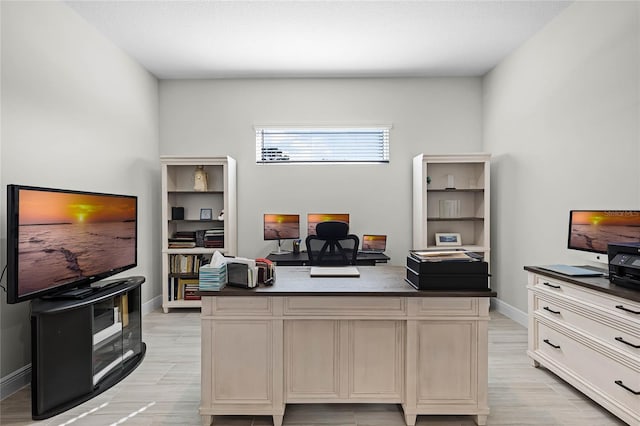8456 Norwich Way, Mount Dora, FL 32757 - office with baseboards and light wood-type flooring
