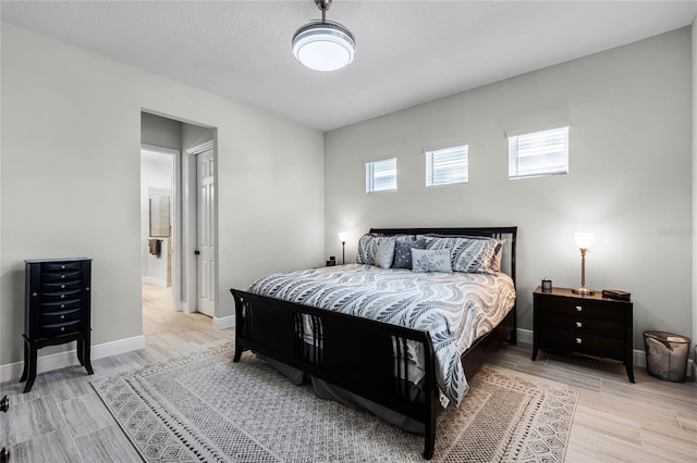 8456 Norwich Way, Mount Dora, FL 32757 - bedroom featuring baseboards and light wood finished floors