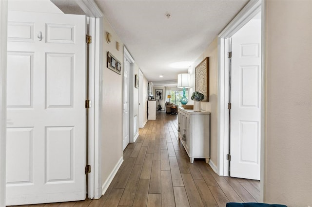 corridor featuring light hardwood / wood-style flooring