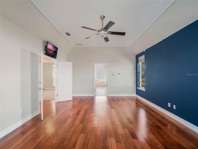 empty room featuring wood-type flooring and ceiling fan