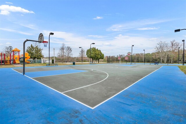 2602 Lodi Cir Unit 105, Kissimmee, FL 34746 - view of sport court featuring a playground and tennis court