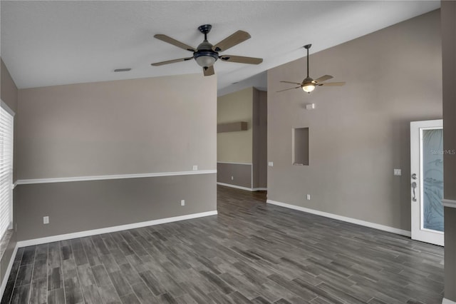 spare room with ceiling fan, high vaulted ceiling, and dark hardwood / wood-style flooring