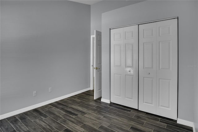 unfurnished bedroom featuring a closet