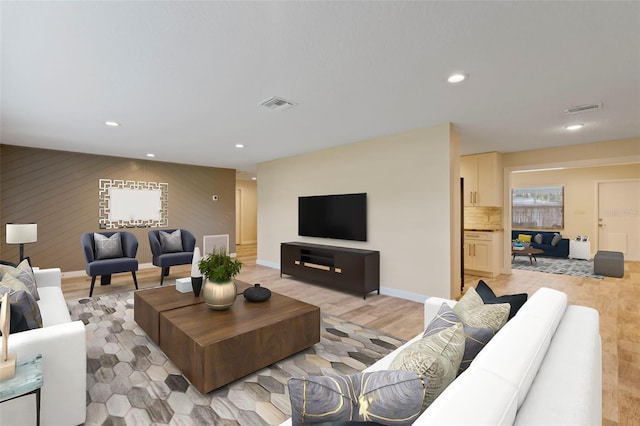 living room with light hardwood / wood-style floors