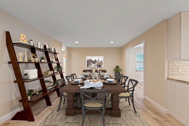 dining room featuring light hardwood / wood-style flooring