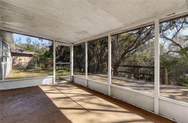 unfurnished sunroom featuring a wealth of natural light