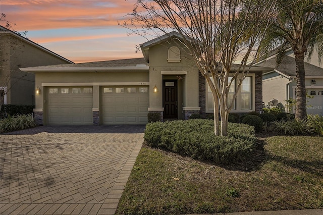 view of front of home with a garage