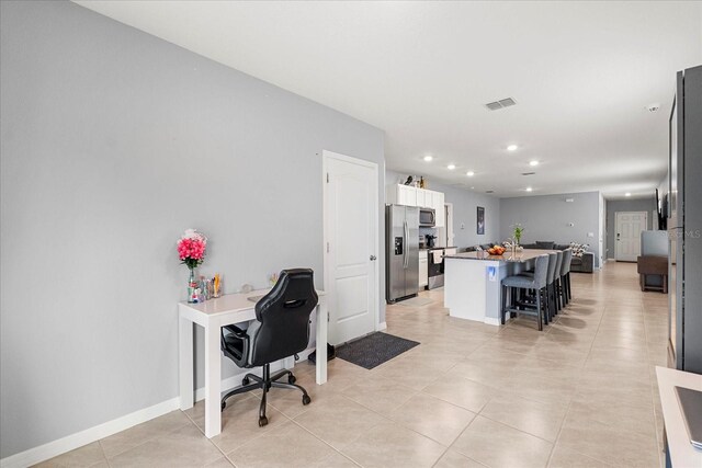 office area featuring light tile patterned floors, baseboards, visible vents, and recessed lighting