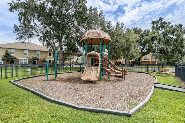 view of playground with a yard