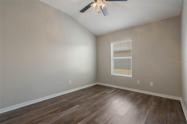 unfurnished room featuring lofted ceiling, dark wood-type flooring, and ceiling fan