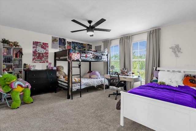 bedroom featuring ceiling fan and carpet flooring