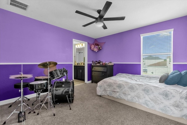 bedroom featuring carpet flooring, connected bathroom, and ceiling fan