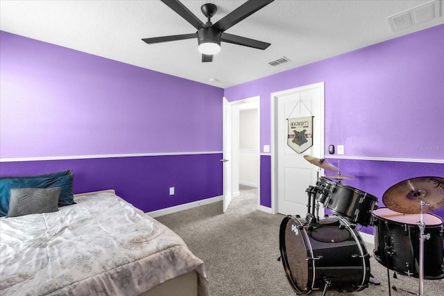 carpeted bedroom featuring ceiling fan