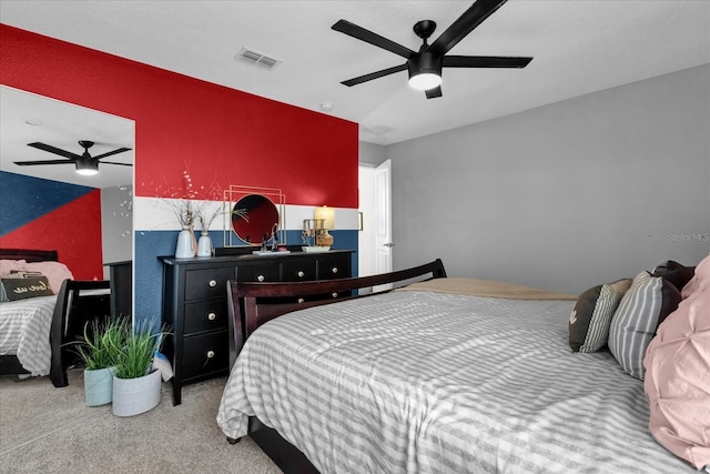 carpeted bedroom featuring ceiling fan