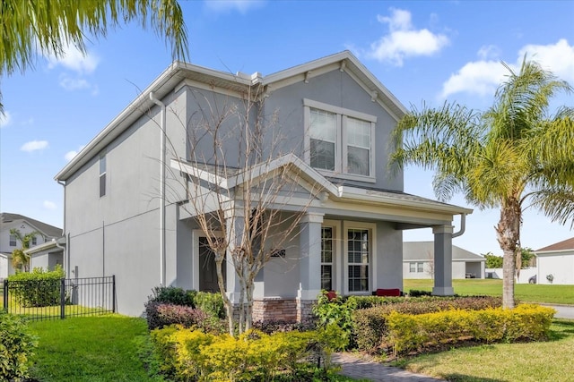 view of front facade featuring a front yard