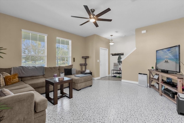 living room featuring ceiling fan