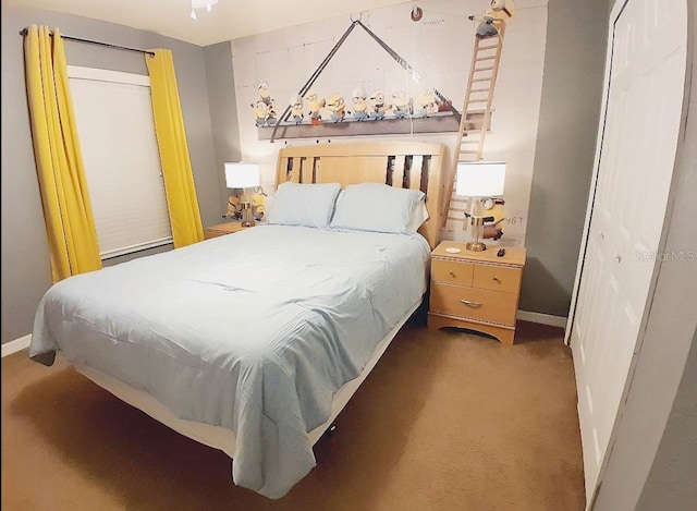 bedroom featuring carpet floors and baseboard heating