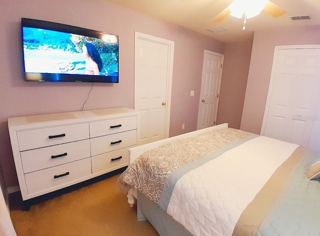 bedroom with carpet flooring and ceiling fan