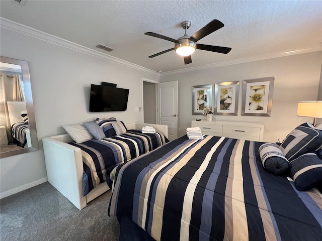 bedroom with ceiling fan, ornamental molding, a textured ceiling, and dark colored carpet