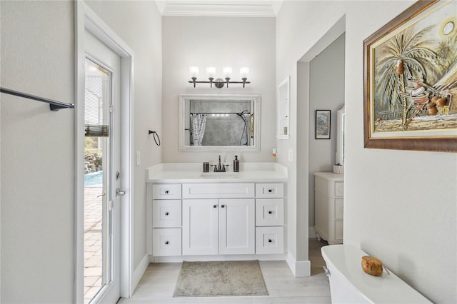 bathroom featuring vanity and crown molding