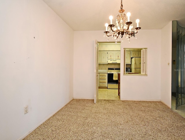 interior space featuring an inviting chandelier, baseboards, and light carpet