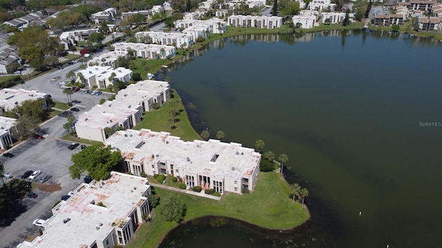 aerial view with a water view and a residential view