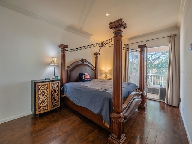 bedroom featuring ornamental molding, dark hardwood / wood-style floors, and access to exterior