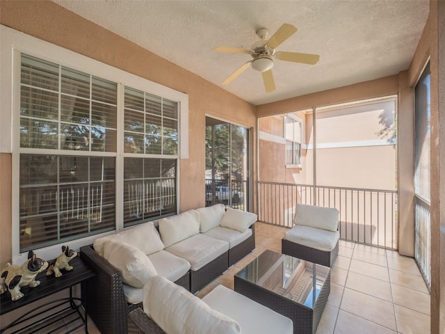 sunroom / solarium with ceiling fan