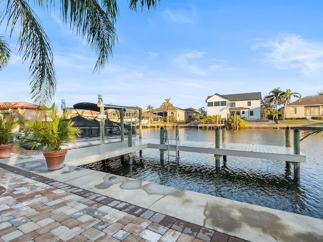 dock area with a water view