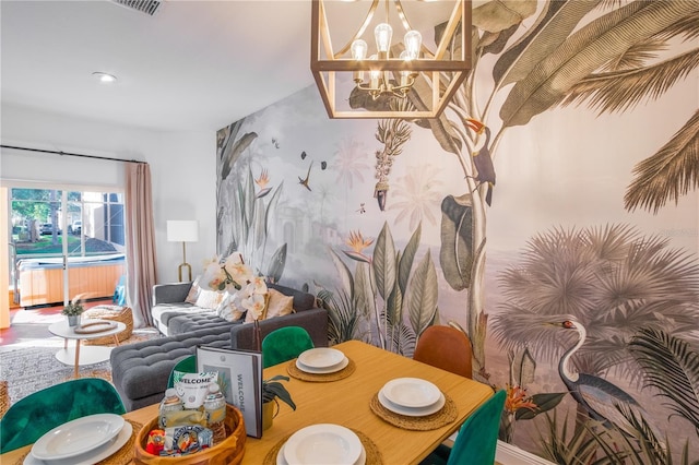 dining room featuring a chandelier